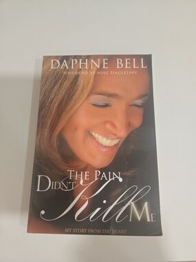 Daphne Bell "The Pain Didn't Kill Me" Hardcover Book - Brown Cover